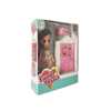 Picture of Annie's sweet doll with a wardrobe.