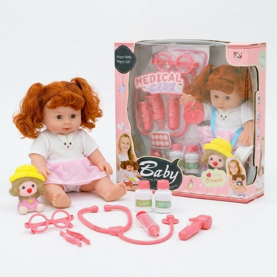 Picture of A little girl doll with medical tools