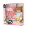 Picture of A little girl doll with medical tools